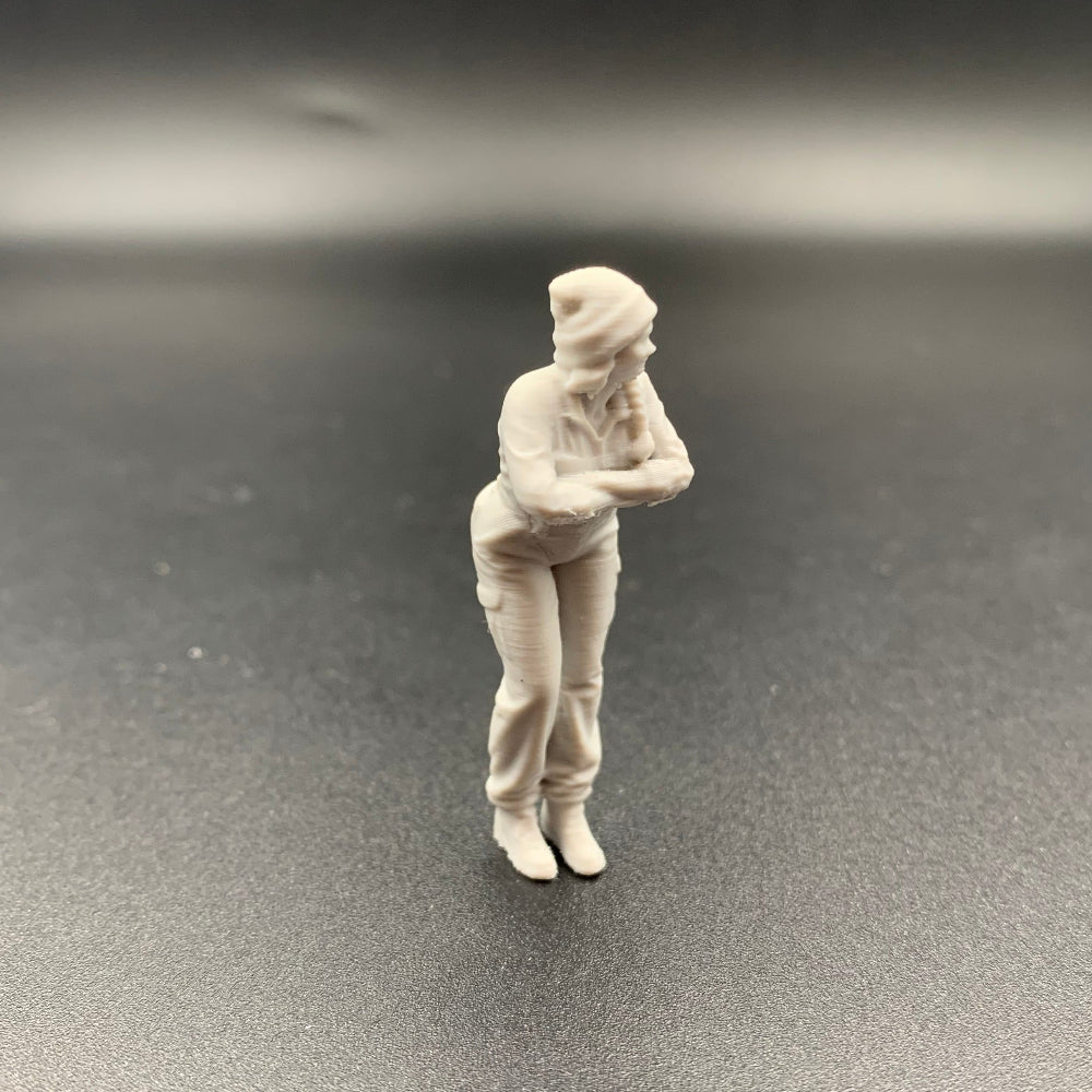 Female Mechanic Crew Figure Leaning Forward