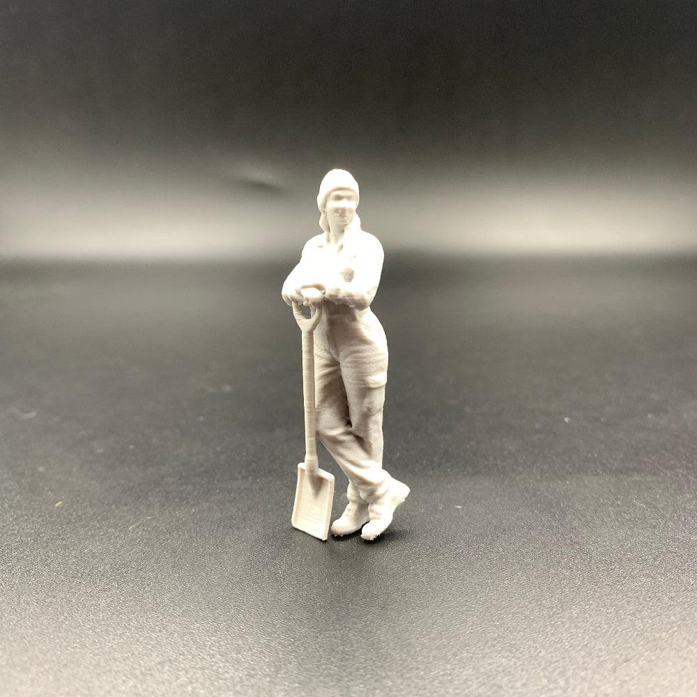 Female Mechanic Engineer Crew Figure Leaning on Shovel