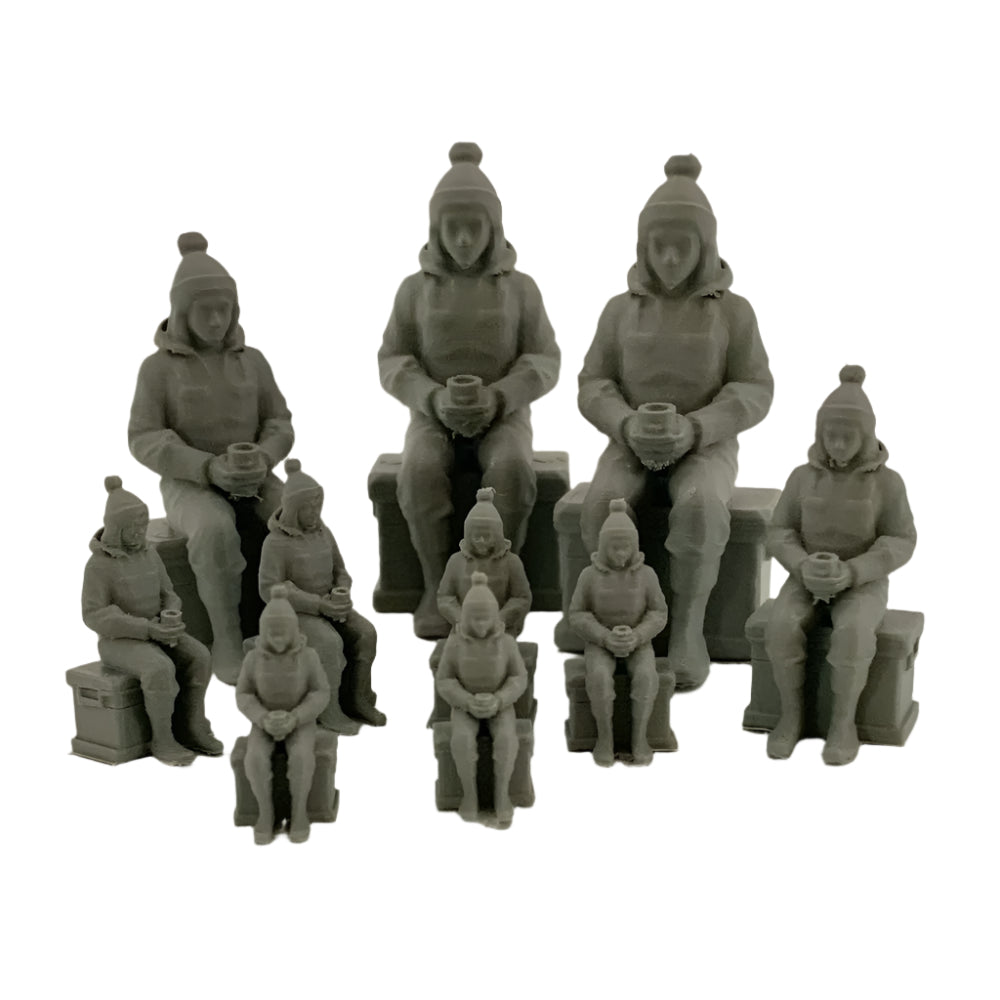 Set of gray figurines in various poses on a white background