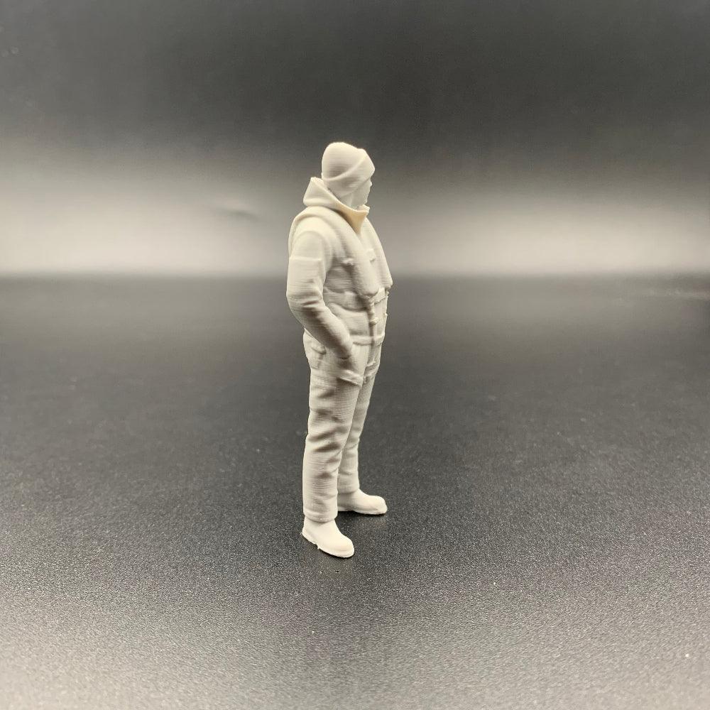 Lifeboat rescue crew figure shown from side view wearing weather gear and beanie hat
