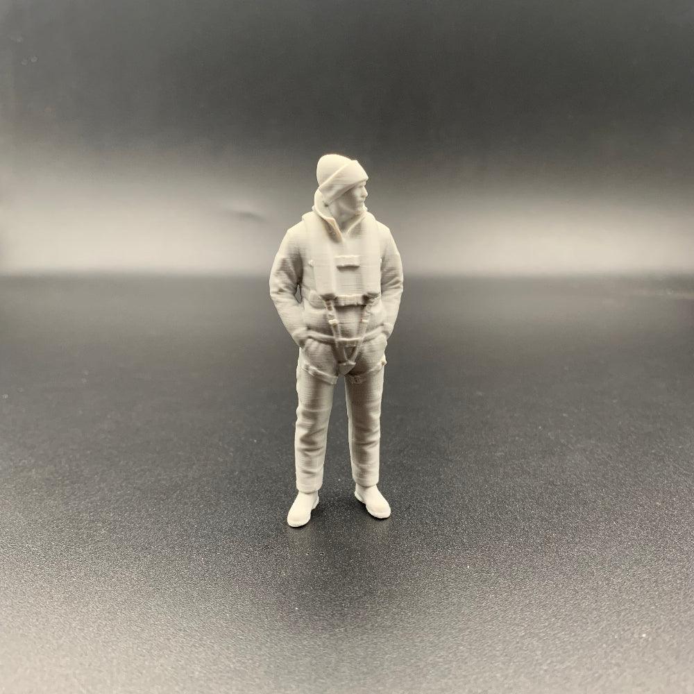 Lifeboat rescue crew figure wearing maritime gear and knitted hat shown from front view