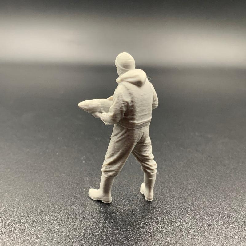 Model Boat Crew Figure holding a fish by SparkFrame Studios