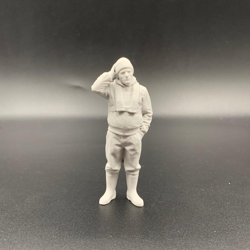 Fisherman model boat crew figure with slim lifejacket and hand resting on head in thoughtful pose