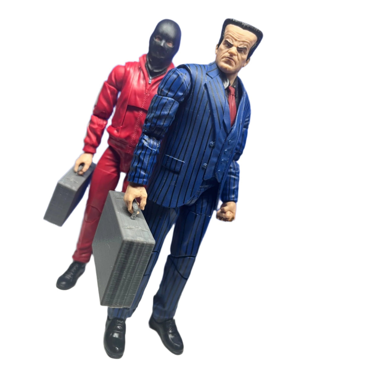 Two action figures holding grey 3D printed miniature briefcase for diorama or wargaming scenes