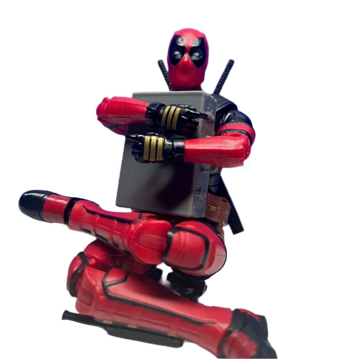 Action figure sitting on floor hugging grey 3D printed miniature classic briefcase for model displays