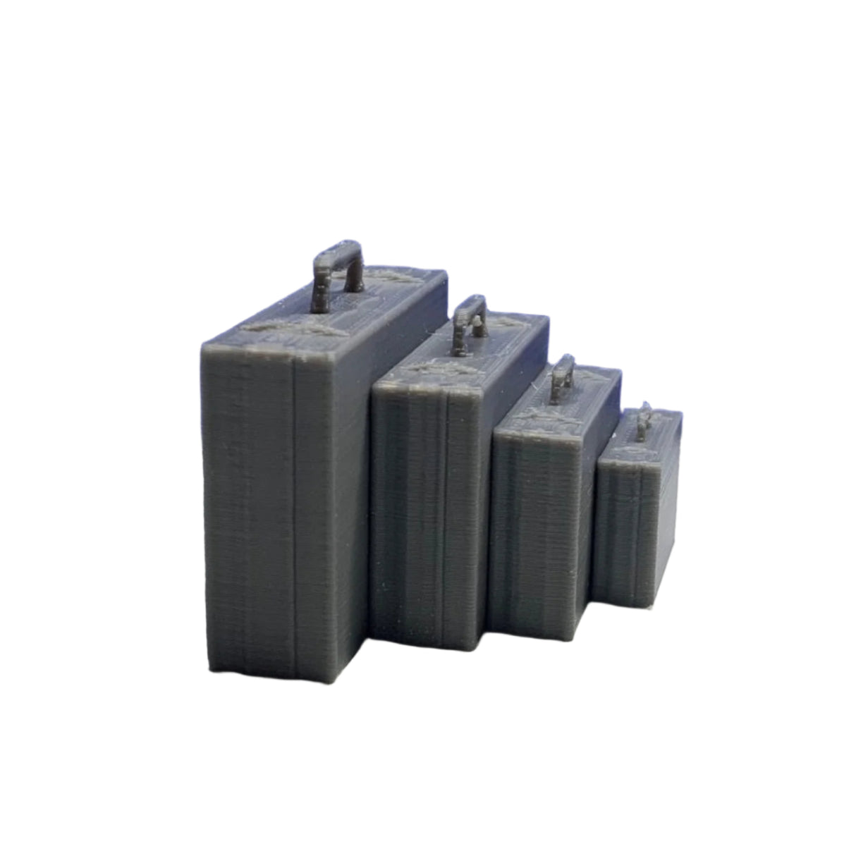 Side view of four 3D printed grey miniature briefcases lined up largest to smallest for modeling