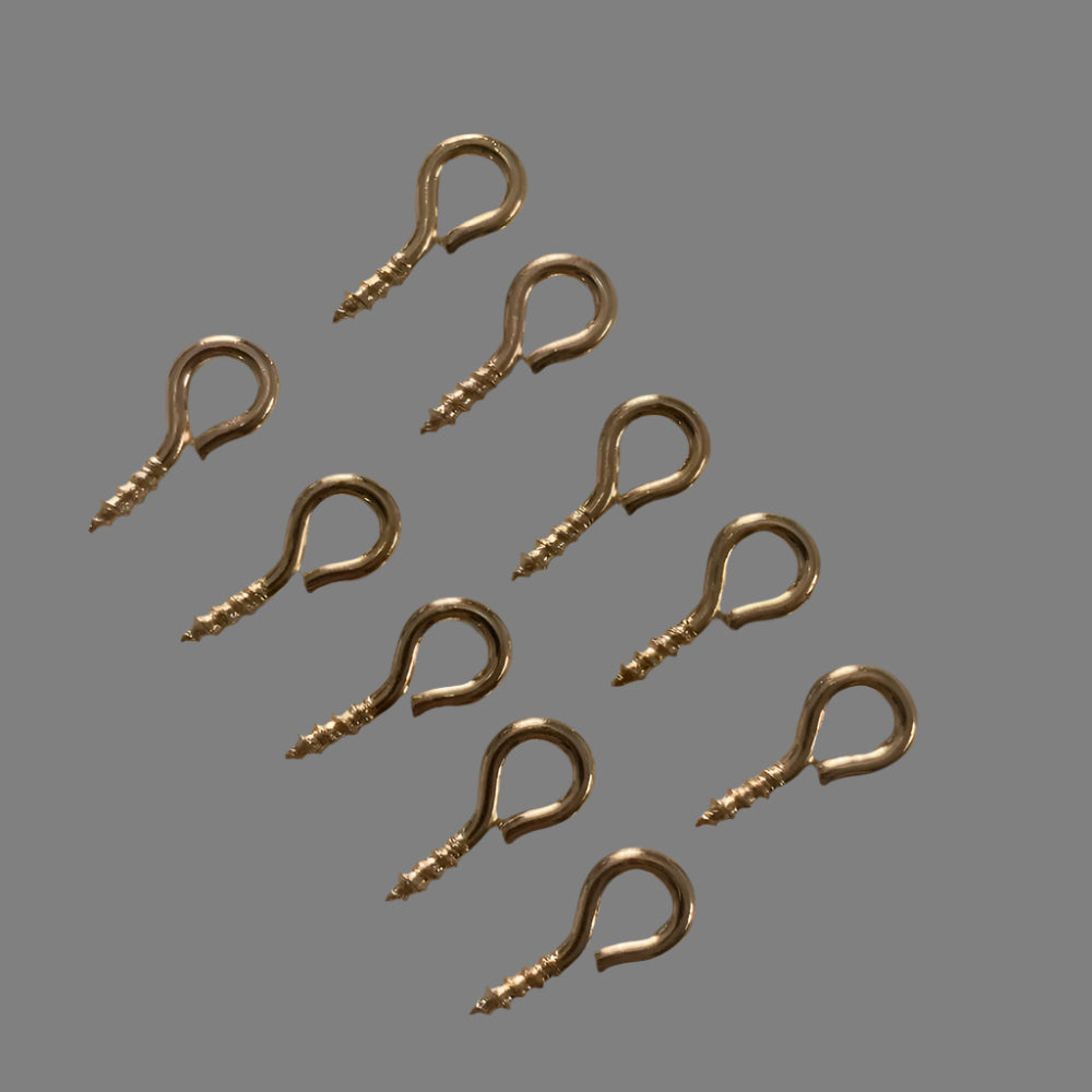 Ten gold eye screws for model boats, fittings, and craft projects.