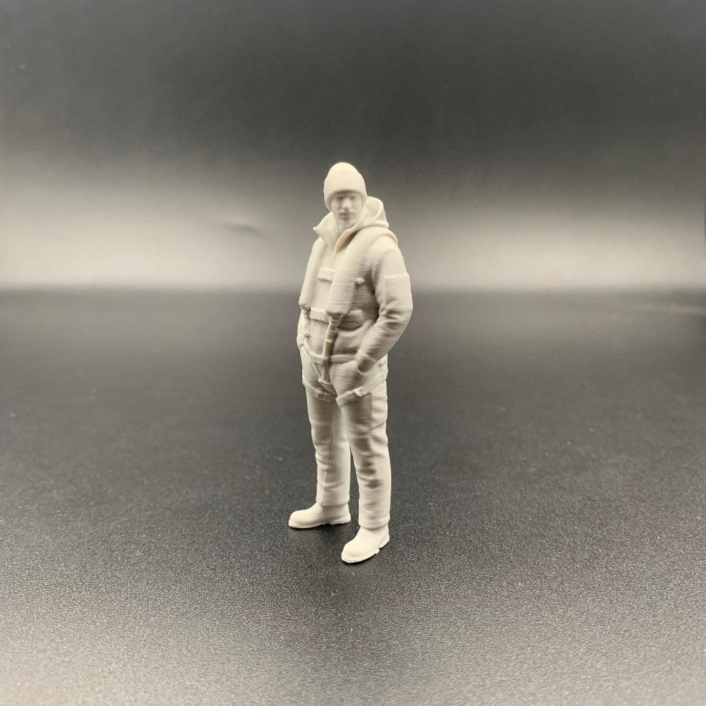 rescue crew figure shown from side view wearing weather gear