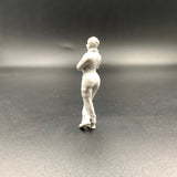 Female Crew Figure Leaning on Shovel