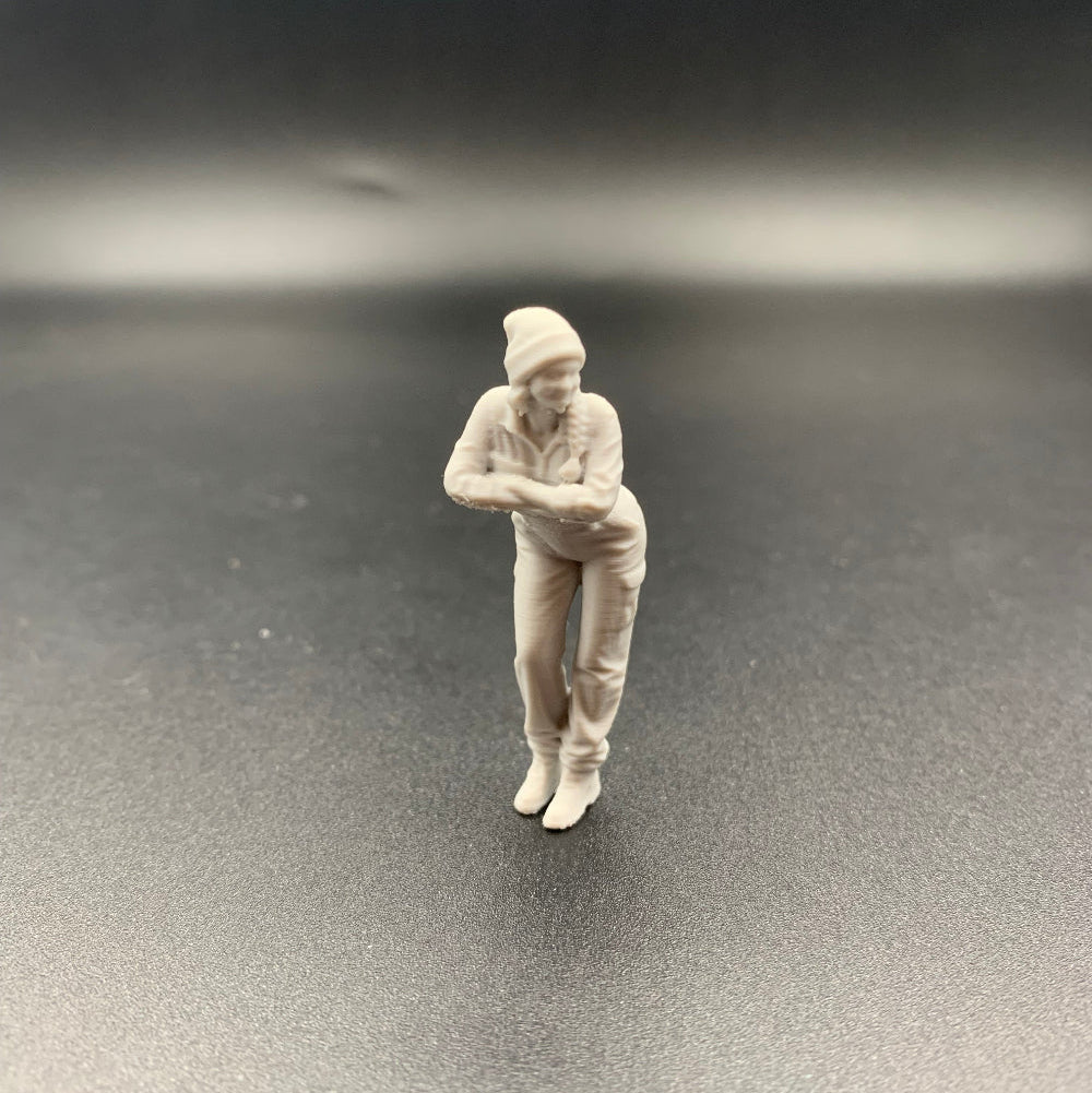 Female Engineer Crew Figure Leaning Forward