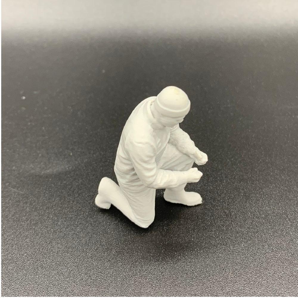Kneeling deckhand crew figure for scale model boats