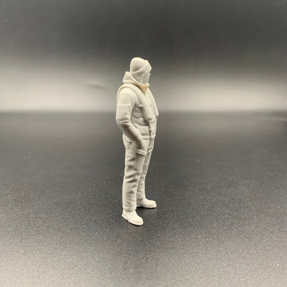 Lifeboat rescue crew figure shown from side view wearing weather gear and beanie hat