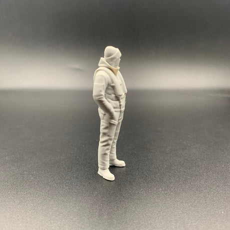 Lifeboat rescue crew figure shown from side view wearing weather gear and beanie hat