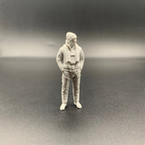 Lifeboat rescue crew figure wearing maritime gear and knitted hat shown from front view