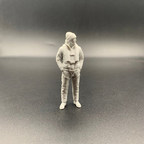 Lifeboat rescue crew figure wearing maritime gear and knitted hat shown from front view