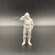 Fisherman model boat crew figure with slim lifejacket and hand resting on head in thoughtful pose