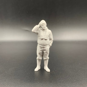 Fisherman model boat crew figure with slim lifejacket and hand resting on head in thoughtful pose