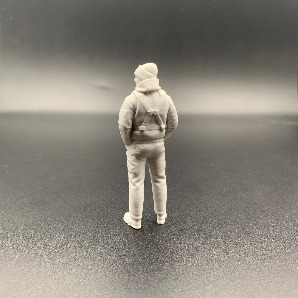 Model boat lifeboat rescue crew figure wearing knitted hat and waterproof gear