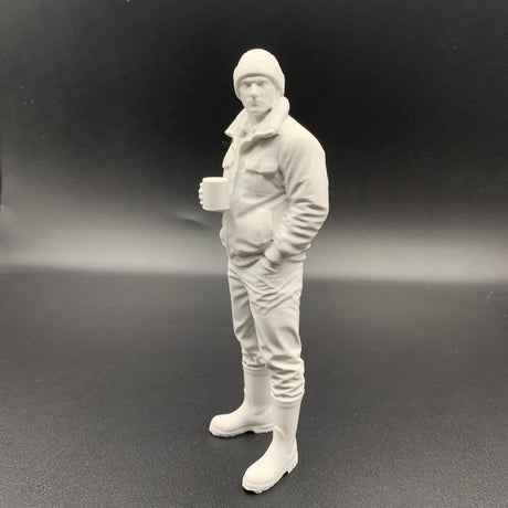 crew figure model boats wih a mug of tea or coffee